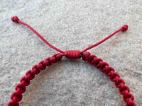 
              Four Way Cross Cord Bracelet
            