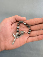 
              Peace & Protection Catholic Rosary Bracelet – Handmade Hematite Pocket Rosary with Holy Spirit Medal
            