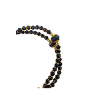 
              Elegant Womans Black Crystal Bead Bracelet With Gold Crucifix And Virgin Mary Medal Double Layered With Gold Accents
            