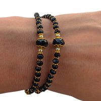 
              Elegant Womans Black Crystal Bead Bracelet With Gold Crucifix And Virgin Mary Medal Double Layered With Gold Accents
            